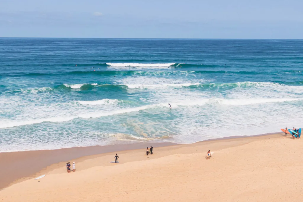 Aerial Shot Of The Beach With Surfers, Seignosse, Landes, France